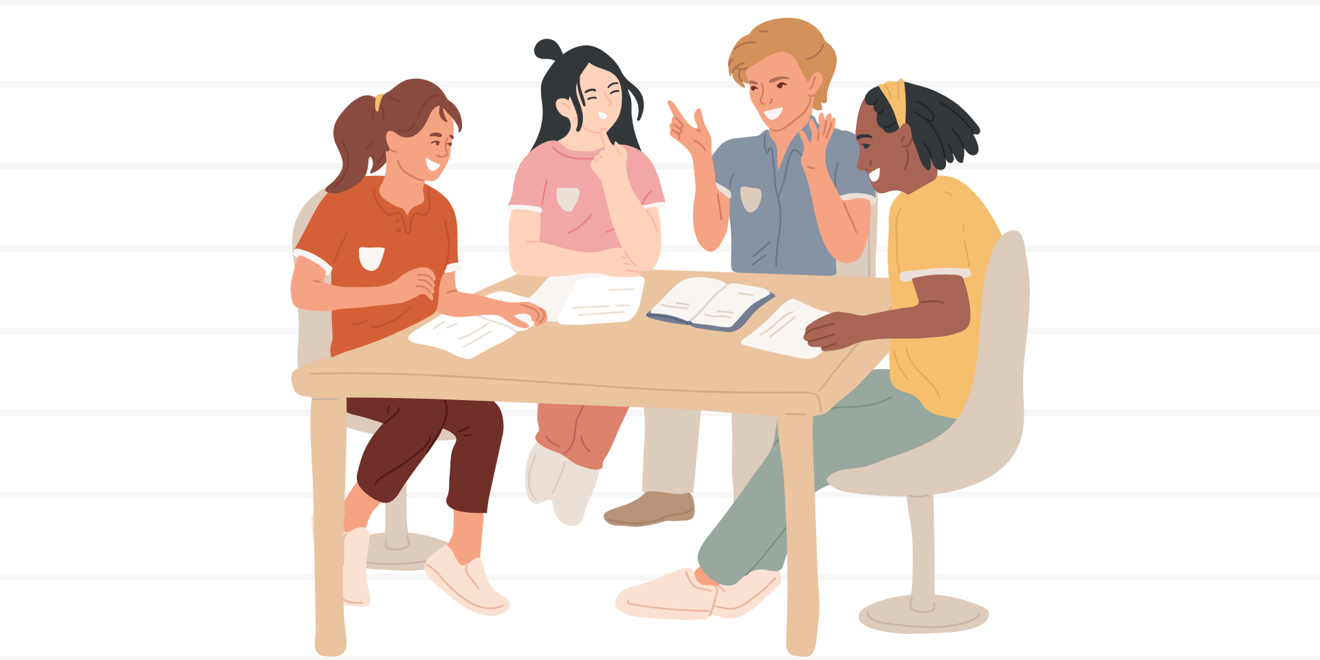 Image of teens sitting at a table.